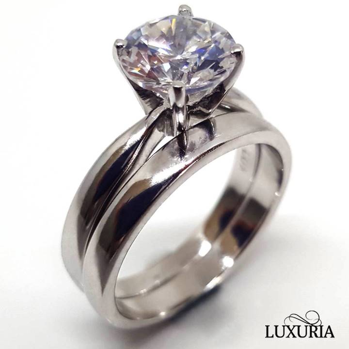 Luxuria faux diamond rings. Classic solitaire round star cut engagement ring cz