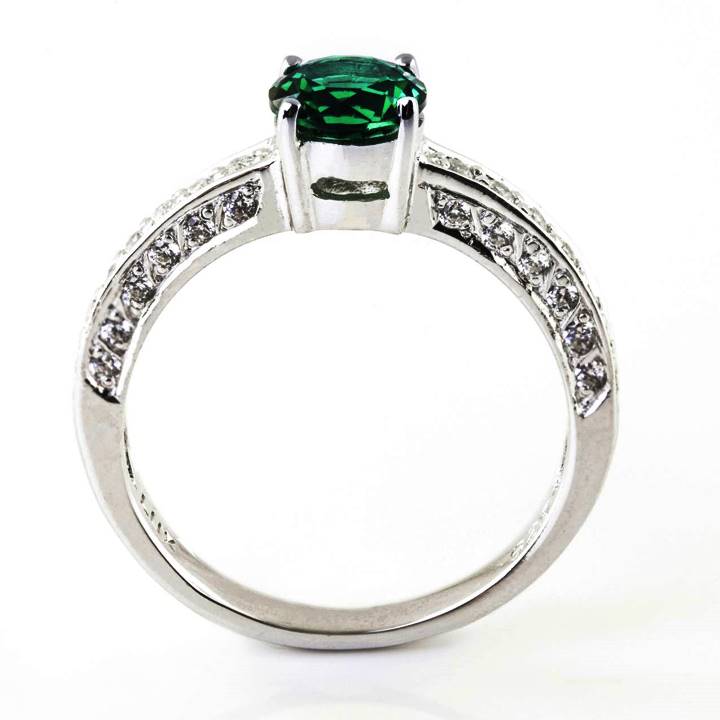 Synthetic emerald engagement ring fake diamond shoulders