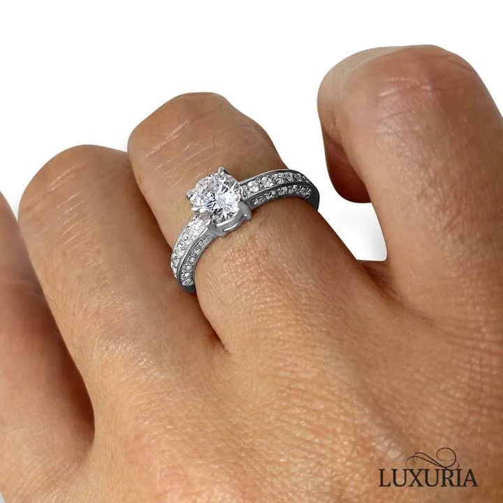 Pave diamond simulant ring on hand