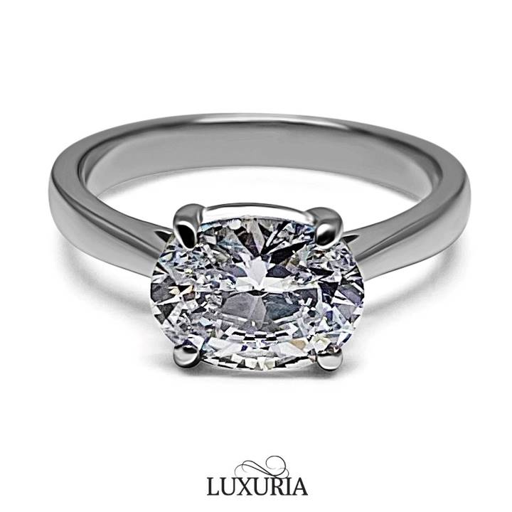 East west oval engagement ring