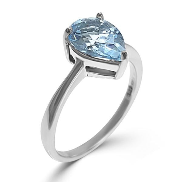 pear topaz solitaire ring